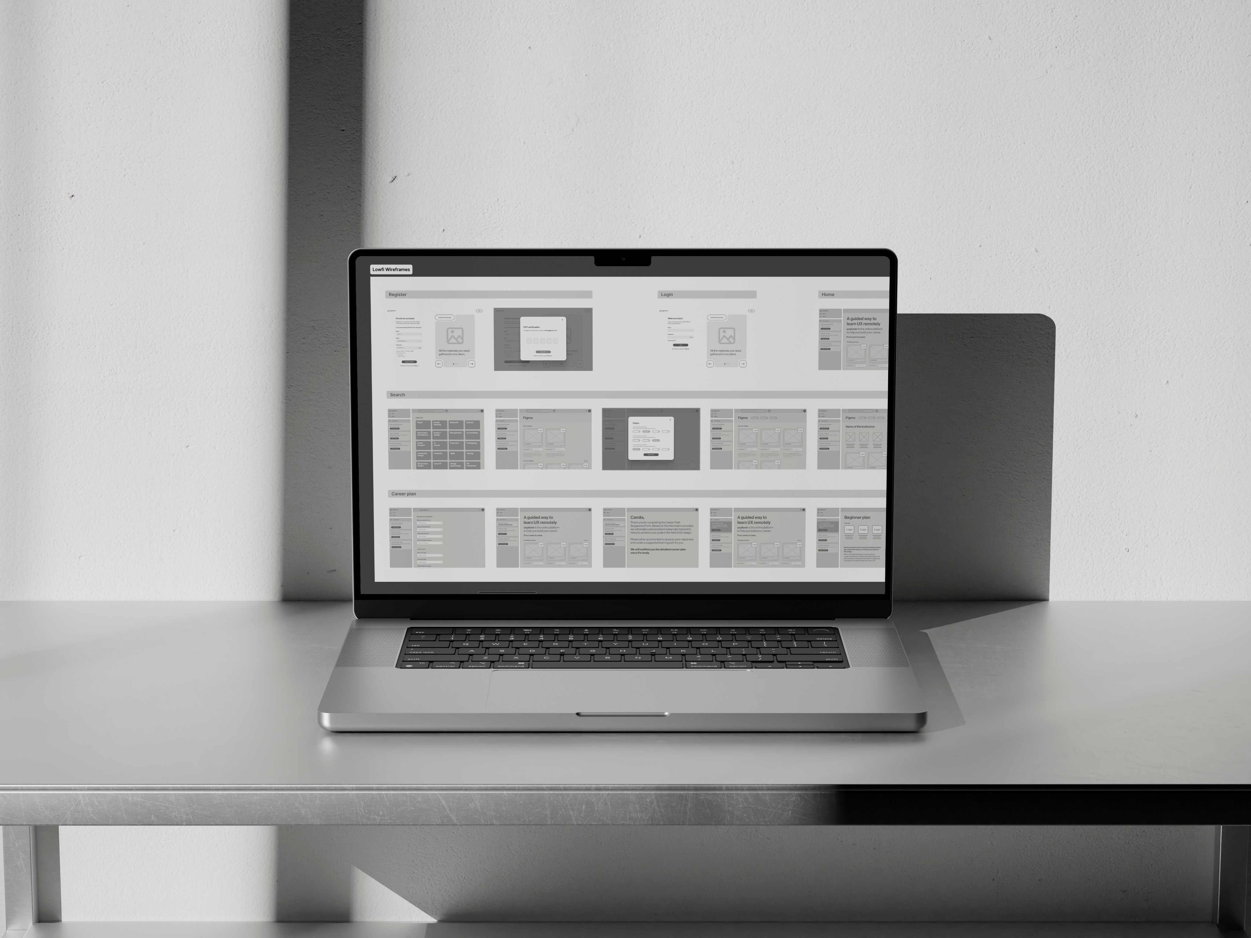 Graphic of a typography specimen showing the alphabet and numerals on top of a dark gray background.